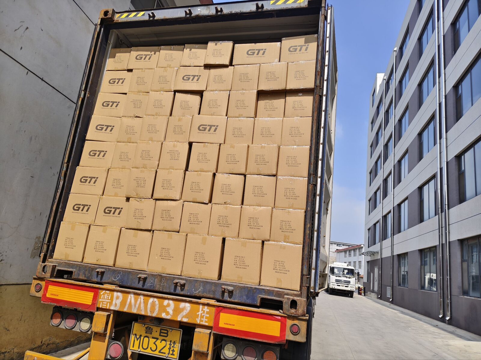 A container loaded with cartons for shipment